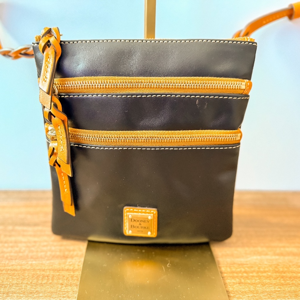 Dooney & Bourke Leather Triple Zip Crossbody bag Dark Brown color